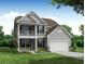 Two-story craftsman style home with gray siding, stone accents, and a balcony at 120 Palfrey Dr, Ridgeville, SC 29472