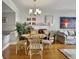 Cozy dining area with hardwood floors and a glass-top table at 1309 Pelican Watch Villas, Seabrook Island, SC 29455