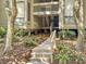 Ground-level condo entrance with stairs and landscaping at 1309 Pelican Watch Villas, Seabrook Island, SC 29455