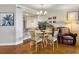 Bright dining area with hardwood floors and glass table at 1309 Pelican Watch Villas, Seabrook Island, SC 29455