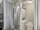 Small laundry room with stackable washer and dryer at 1309 Pelican Watch Villas, Seabrook Island, SC 29455