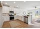 Modern kitchen with white cabinets, stainless steel appliances, and marble countertops at 229 Abercom Place Dr, Moncks Corner, SC 29461