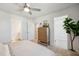 Bedroom with ceiling fan, dresser, and access to bathroom and closet at 229 Abercom Place Dr, Moncks Corner, SC 29461