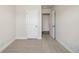 Bedroom with carpet, white walls and doors to hallway and closet at 229 Abercom Place Dr, Moncks Corner, SC 29461