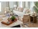 Bright living room with a white couch and two armchairs at 229 Abercom Place Dr, Moncks Corner, SC 29461