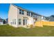 Spacious backyard with a patio and wooden fence, offering privacy and outdoor space at 229 Abercom Place Dr, Moncks Corner, SC 29461