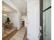 Bright and airy entryway with hardwood floors and a view into the living area at 229 Abercom Place Dr, Moncks Corner, SC 29461