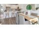 Light-filled dining area features a wooden table and comfortable seating at 229 Abercom Place Dr, Moncks Corner, SC 29461