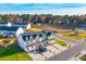 Aerial view of townhomes near a playground with ample parking and green lawns at 229 Abercom Place Dr, Moncks Corner, SC 29461