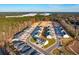 An expansive aerial view of a large townhome community near a wooded area at 229 Abercom Place Dr, Moncks Corner, SC 29461