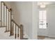 Modern staircase with wooden railings and white risers at 229 Abercom Place Dr, Moncks Corner, SC 29461