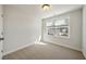 Bright bedroom with carpeted floor and a large window at 229 Abercom Place Dr, Moncks Corner, SC 29461