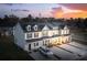 Aerial view of townhome community at sunset at 229 Abercom Place Dr, Moncks Corner, SC 29461