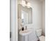 Small, modern bathroom with pedestal sink and updated vanity at 229 Abercom Place Dr, Moncks Corner, SC 29461