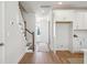 Bright entryway with hardwood floors and staircase leading upstairs at 229 Abercom Place Dr, Moncks Corner, SC 29461
