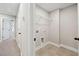 Laundry room with wire shelving and tile flooring at 205 Abercom Place Dr, Moncks Corner, SC 29461