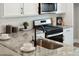 Kitchen boasts granite countertops, white cabinets, and a breakfast bar at 205 Abercom Place Dr, Moncks Corner, SC 29461