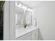 Double vanity bathroom with modern lighting and mirrors at 205 Abercom Place Dr, Moncks Corner, SC 29461