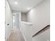 Bright hallway with carpeted floors and neutral walls at 205 Abercom Place Dr, Moncks Corner, SC 29461