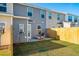 Private backyard with a patio and wooden fence at 205 Abercom Place Dr, Moncks Corner, SC 29461