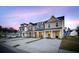 Four townhouses with parking and landscaping at 205 Abercom Place Dr, Moncks Corner, SC 29461