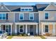 Townhouses with front porches and driveways at 205 Abercom Place Dr, Moncks Corner, SC 29461