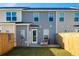 Private backyard with a patio and wooden fence at 205 Abercom Place Dr, Moncks Corner, SC 29461