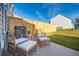 Private patio with wicker furniture and a wooden fence at 205 Abercom Place Dr, Moncks Corner, SC 29461