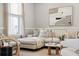 Cozy living room with a sectional sofa and stylish decor at 205 Abercom Place Dr, Moncks Corner, SC 29461