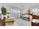Main bedroom with a large four poster bed and plenty of natural light at 377 Tupelo Lake Dr, Summerville, SC 29486