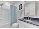 Simple bathroom with single vanity, shower/tub combo, and dark countertop at 377 Tupelo Lake Dr, Summerville, SC 29486