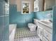 Light blue bathroom with white vanity, toilet and bathtub at 219 Owens Dr, Summerville, SC 29485