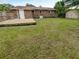 Large backyard with a wooden deck and a detached shed at 219 Owens Dr, Summerville, SC 29485