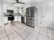 Bright kitchen featuring stainless steel appliances and tile floor at 219 Owens Dr, Summerville, SC 29485