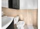 Small bathroom with beige tile, white sink and toilet at 219 Owens Dr, Summerville, SC 29485