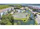 Aerial view of tennis courts and pool area at 100 Mariners Cay Dr, Folly Beach, SC 29439