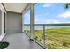 Screened balcony with water views and a tranquil setting at 100 Mariners Cay Dr, Folly Beach, SC 29439