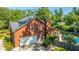 Brick house with attached garage and a well-maintained lawn at 181 Pekoe Ct, Summerville, SC 29483