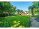 Landscaped backyard with grassy lawn at 181 Pekoe Ct, Summerville, SC 29483