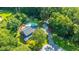 Home with inground pool and carport, surrounded by trees at 181 Pekoe Ct, Summerville, SC 29483