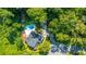 Two-story house with pool and driveway, nestled in woods at 181 Pekoe Ct, Summerville, SC 29483