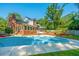 Inviting backyard oasis featuring a sparkling pool and spacious patio area at 181 Pekoe Ct, Summerville, SC 29483
