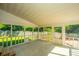 Bright screened porch with view of the backyard at 181 Pekoe Ct, Summerville, SC 29483