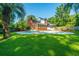 Large backyard with inground pool and lush lawn at 181 Pekoe Ct, Summerville, SC 29483