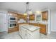 Updated kitchen with granite island and wood cabinets at 181 Pekoe Ct, Summerville, SC 29483