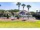 Community clubhouse with palm trees at 1637 Live Oak Park, Seabrook Island, SC 29455