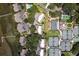 Aerial view of community, tennis courts, and marsh at 1637 Live Oak Park, Seabrook Island, SC 29455