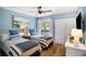 Twin bedroom with light blue walls and private balcony at 1637 Live Oak Park, Seabrook Island, SC 29455