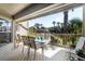 Outdoor deck with patio furniture and lush landscaping views at 1637 Live Oak Park, Seabrook Island, SC 29455