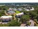 Aerial view of community, tennis courts, and lagoon at 1637 Live Oak Park, Seabrook Island, SC 29455